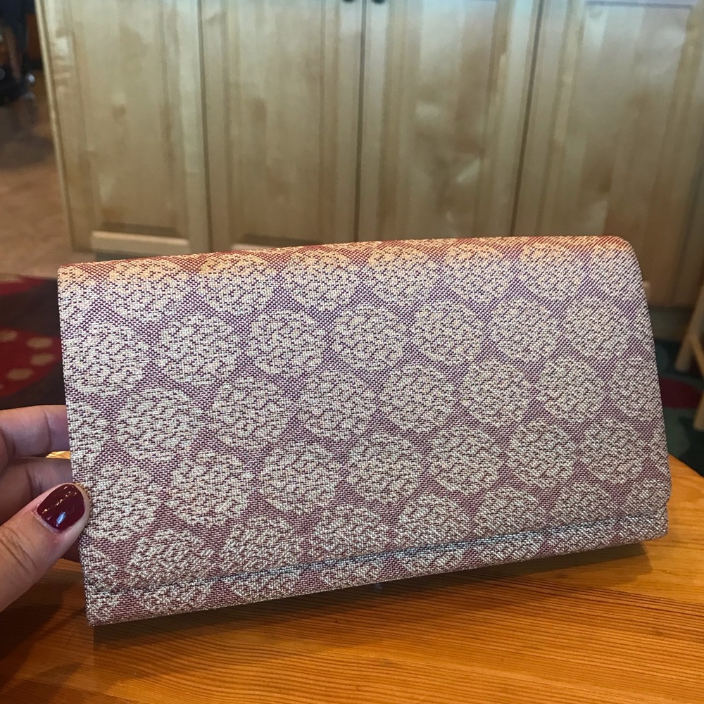 Vintage button closure clutch